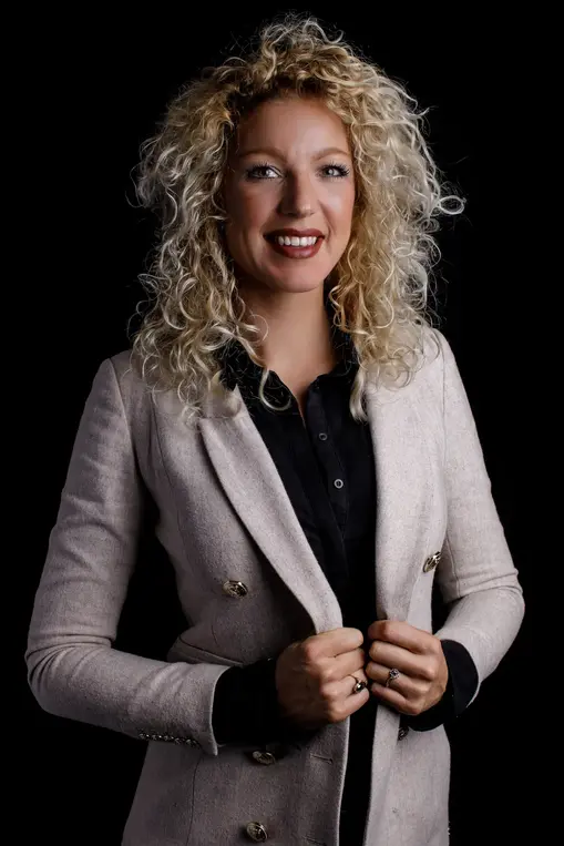 Business portrait of a female professional with curls