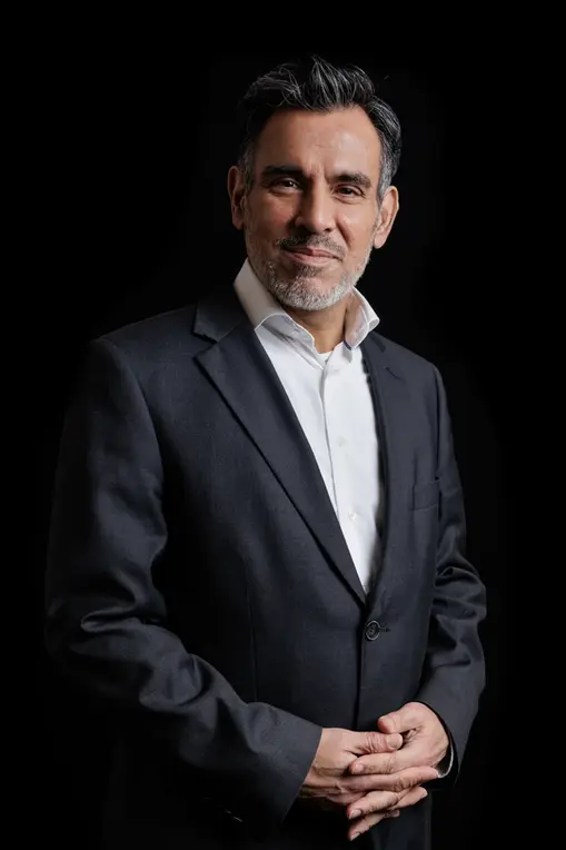 Business portrait of man in suit with relaxed pose