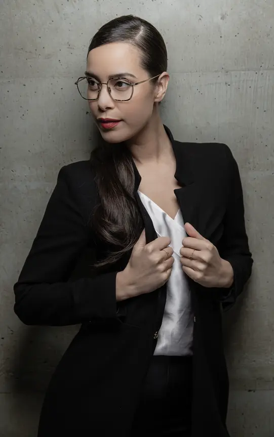 Business-dressed woman with glasses in fashion campaign