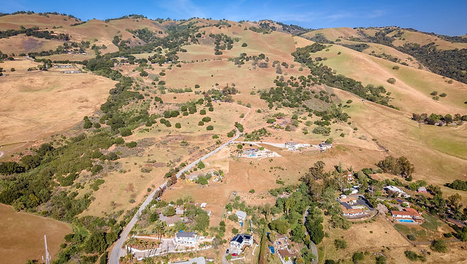 Spectacular +-40-acre ranch offering sweeping panoramic views of Silicon Valley and the eastern hills of San Jose. Comprised of four separate parcels zoned HS-D1, the property offers exceptional flexibility and a variety of potential uses. Ideal for a private estate, family compound, or multi-home retreat. Rare for hillside properties, the land features an abundance of mostly flat to gently sloping terrain, making it highly usable and easy to develop. Once a thriving apricot orchard and vineyard, this remarkable property has been cherished by the same family for generations. Located on East Aborn Road, with convenient access to Highways 101, 680, and 280, it offers the perfect balance of privacy, natural beauty, and commuter convenience.