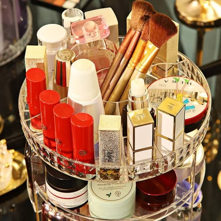 Boîte rotative de rangement pour produits de maquillage