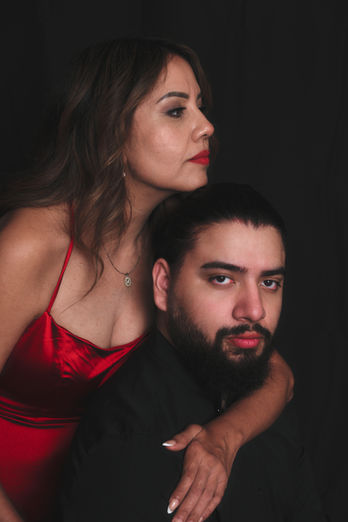 Dramatic studio portrait of mother and son during studio family photography session in Austin, TX by Ortega Photography