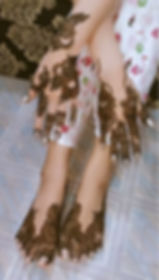 traditional mehndi flower designs on two hand and feet