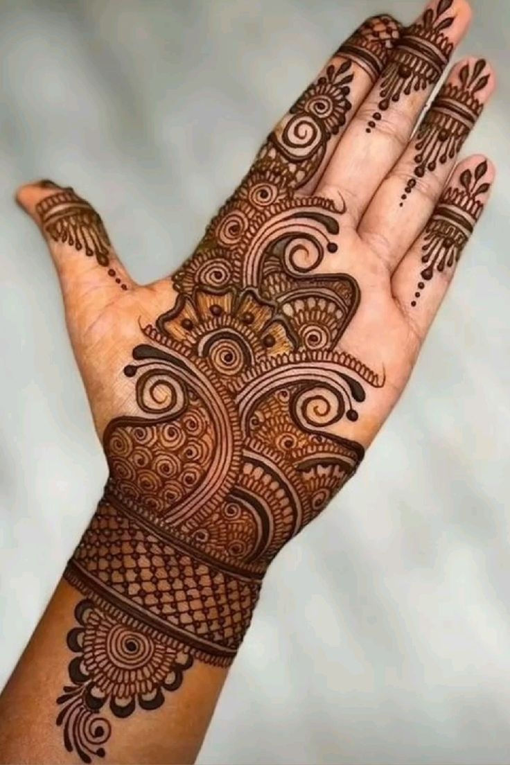 paisley and flower mehndi design on left hand