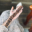 central flower border mehndi design on left hand