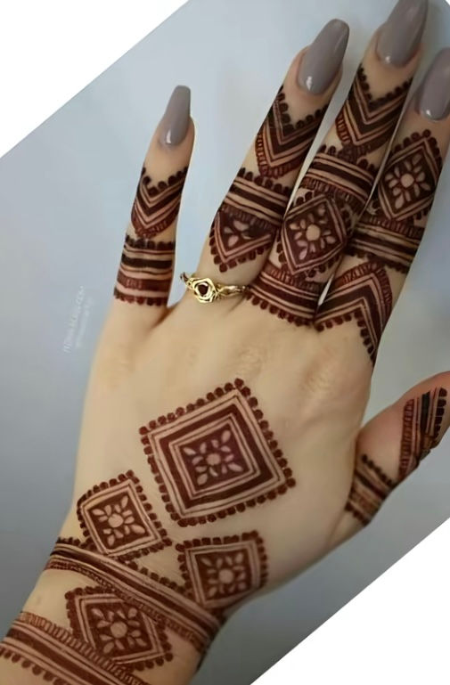 rectangular mehndi design on hand with symmetry in fingers.