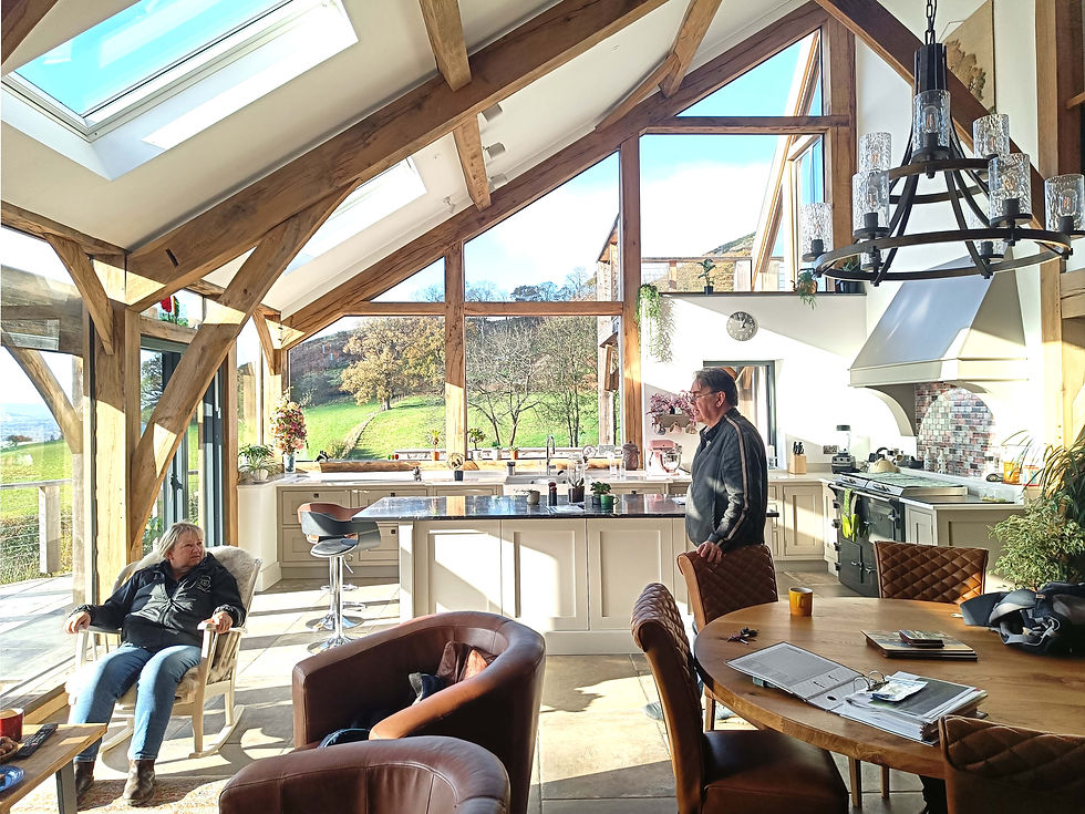 Interior view of the main central living space featuring the oak frame and direct glazing
