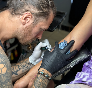 tattoo artist Matthew Kurtyka in the studio