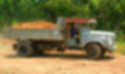 What is a dump truck delivering dirt to D&G Resort in Thailand.