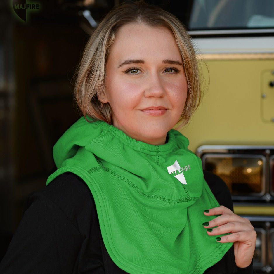 Thumbnail: A female firefighter wears a lime green fire hood