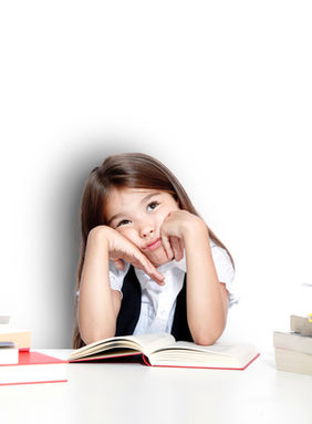 girl surrounded with books and is unfocused