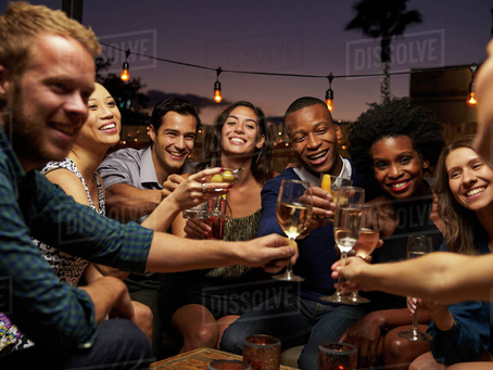 ThirstDate | A group of friends meeting at a rooftop bar in Tampa.