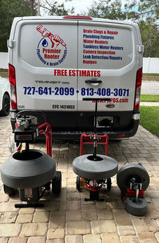 Emergency Plumber Near Me | Premier Rooter Plumbing and Drain Services | PRPDS Van with Drain Snake in foreground