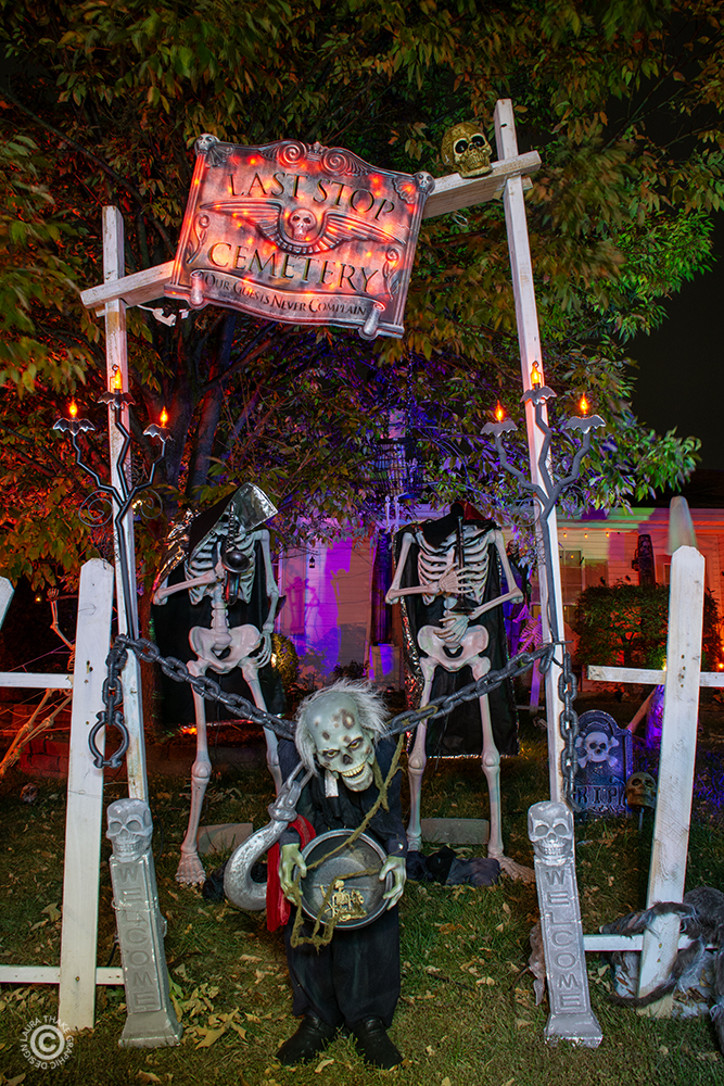 The gate to the cemetery is guarded by this little man, and some skeletons playing jazz.