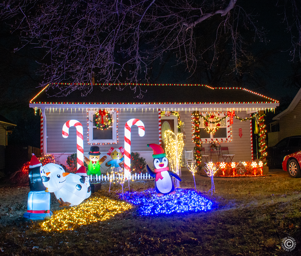 Red and white gingerbread house in St. Ann Missouri.
