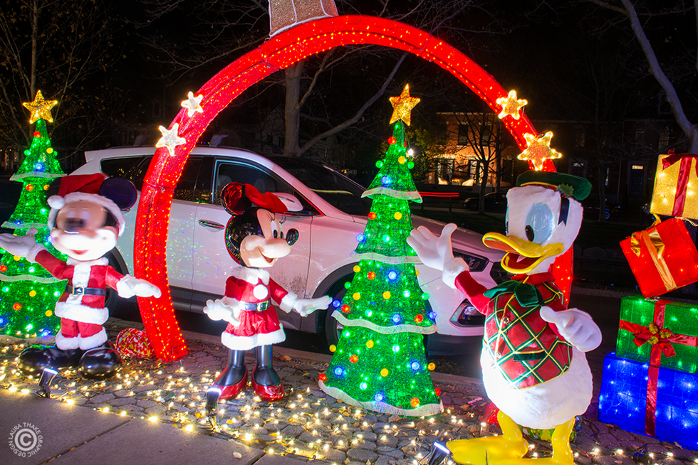 Mickey Mouse and Minnie Mouse, with Donald Duck Christmas characters talking and singing.