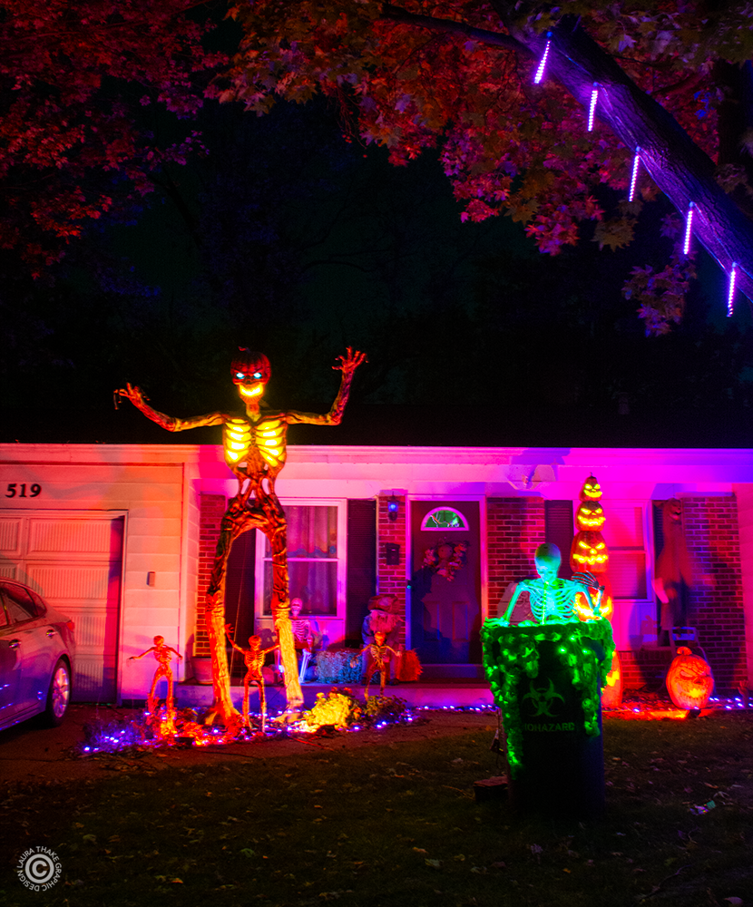 A skeleton with an upset tummy and inferno man watching him puke.