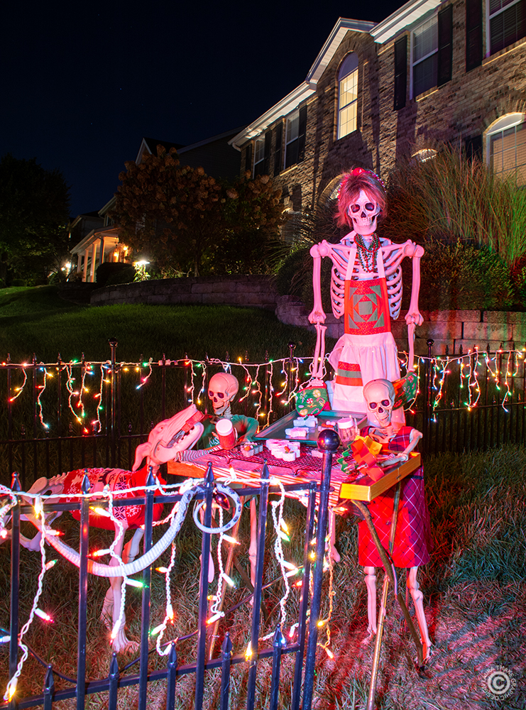 Skeletons baking cookies with their Mom.