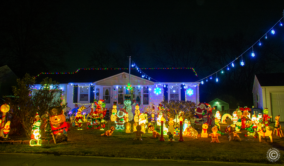snow and blow molds decorate this front yard.