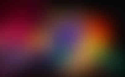 A tall Santa is waving to visitors to tune in and listen to the music while the lights dance.