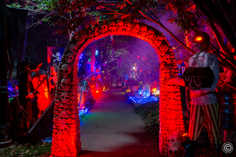 Enter the New Town Haunting if you dare, walk with the other guests, but watch out for grabbing creatures.