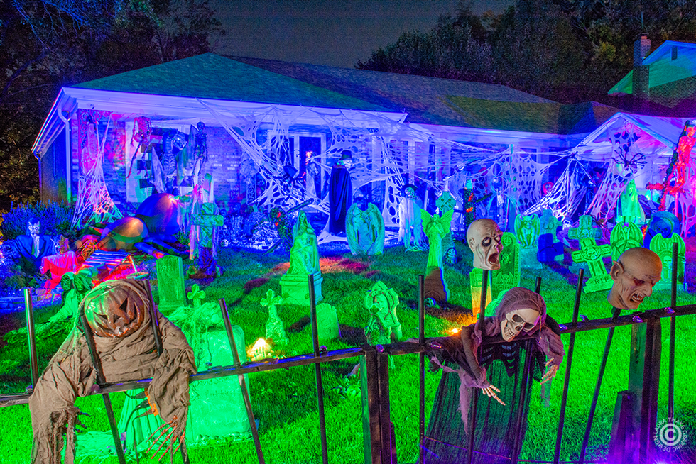 A very dead cemetery complete with zombies and ghouls.
