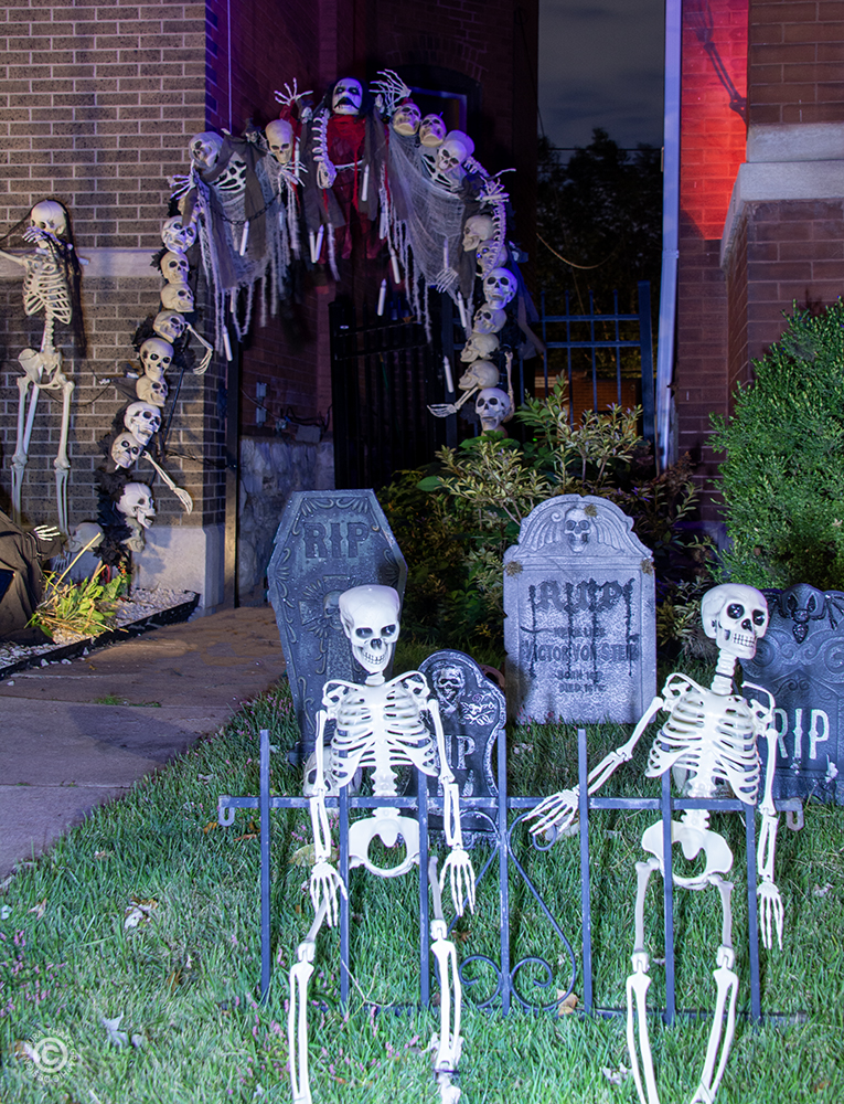 A skeleton archway and graveyard.