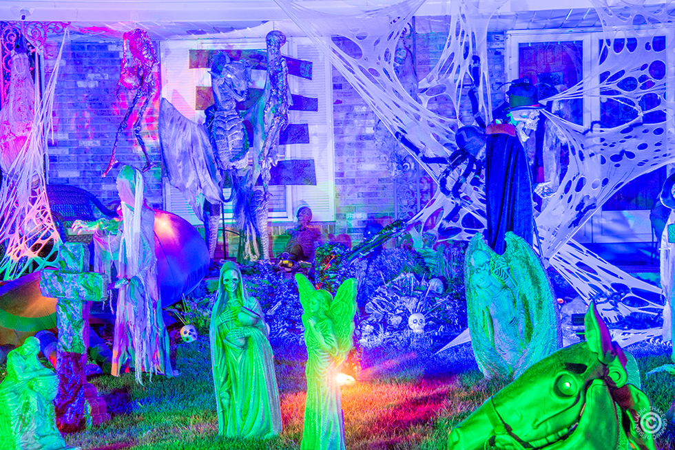 A dragon growling from the porch and a grave digger wandering around.