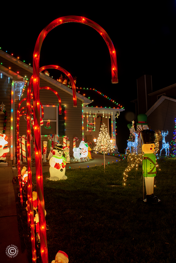 Christmas candy canes decorate the house and yard in St. Louis County MO.