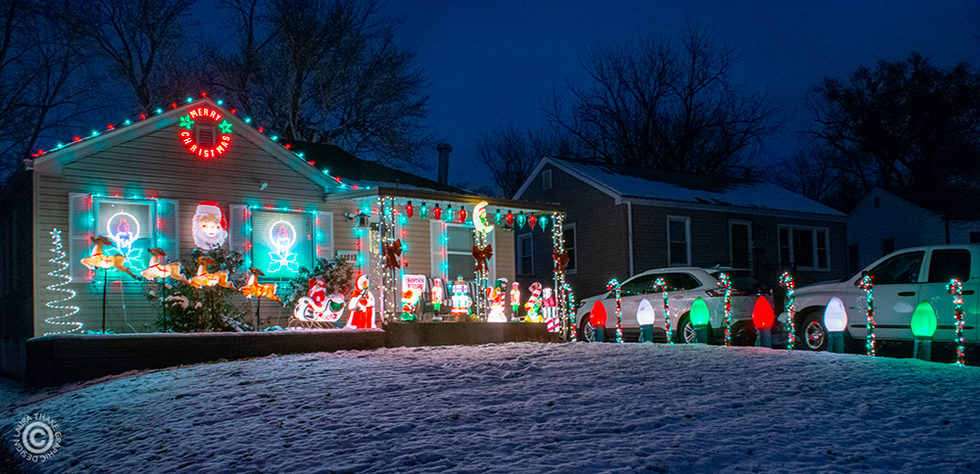 A blanket of snow offsets the Christmas lights at this house so beautifully.