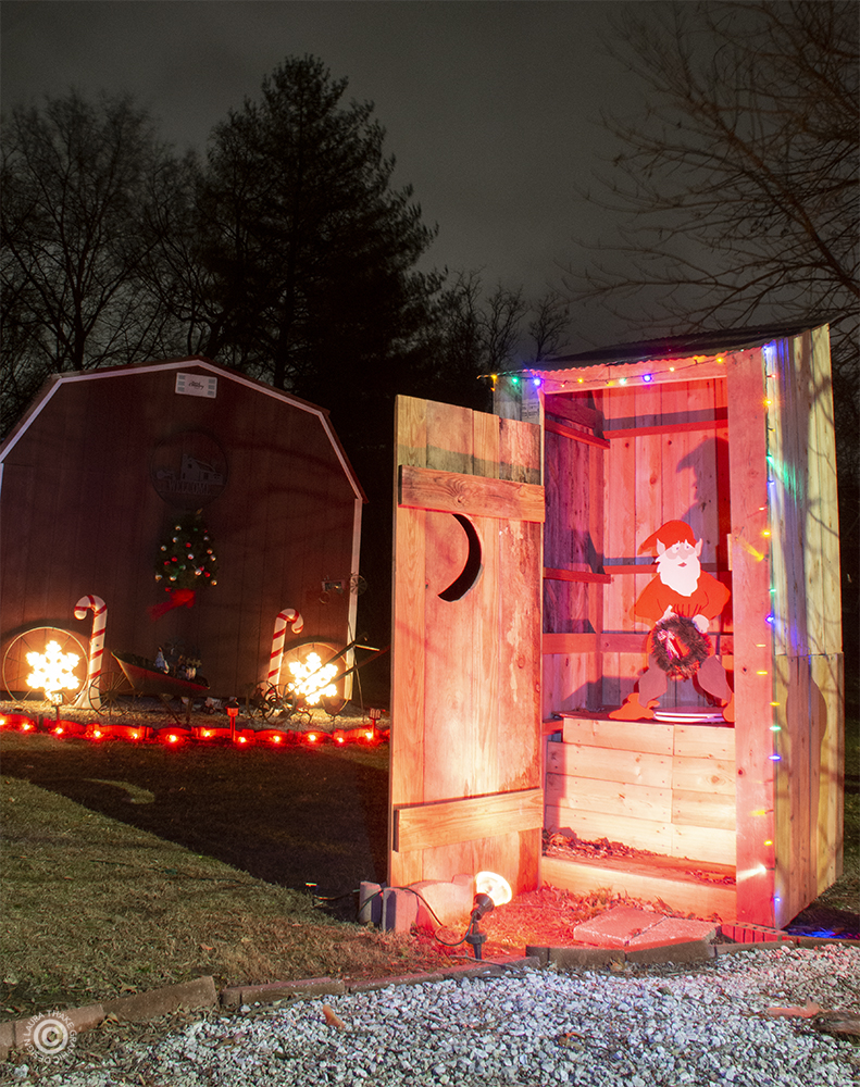 An elf using the outhouse!