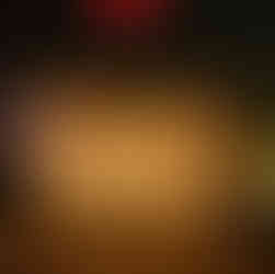 Glowing white lights and modern Christmas trees on the front porch.  