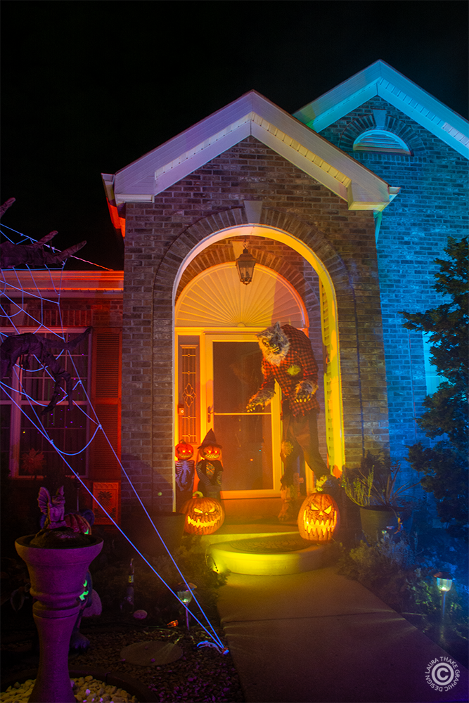 The werewolf stands at the door to greet trick or treaters
