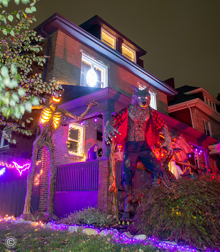 The howling werewolf and the Inferno Man guard the porch.