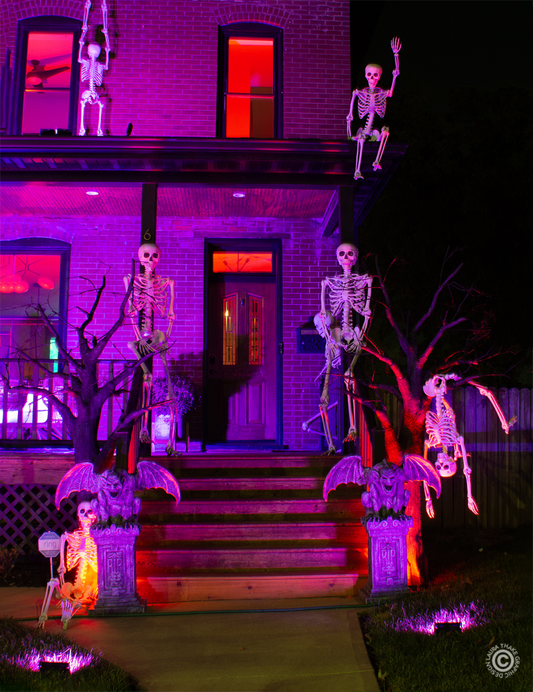 Extremely well done front porch entrance with the gargoyles and skeletons.