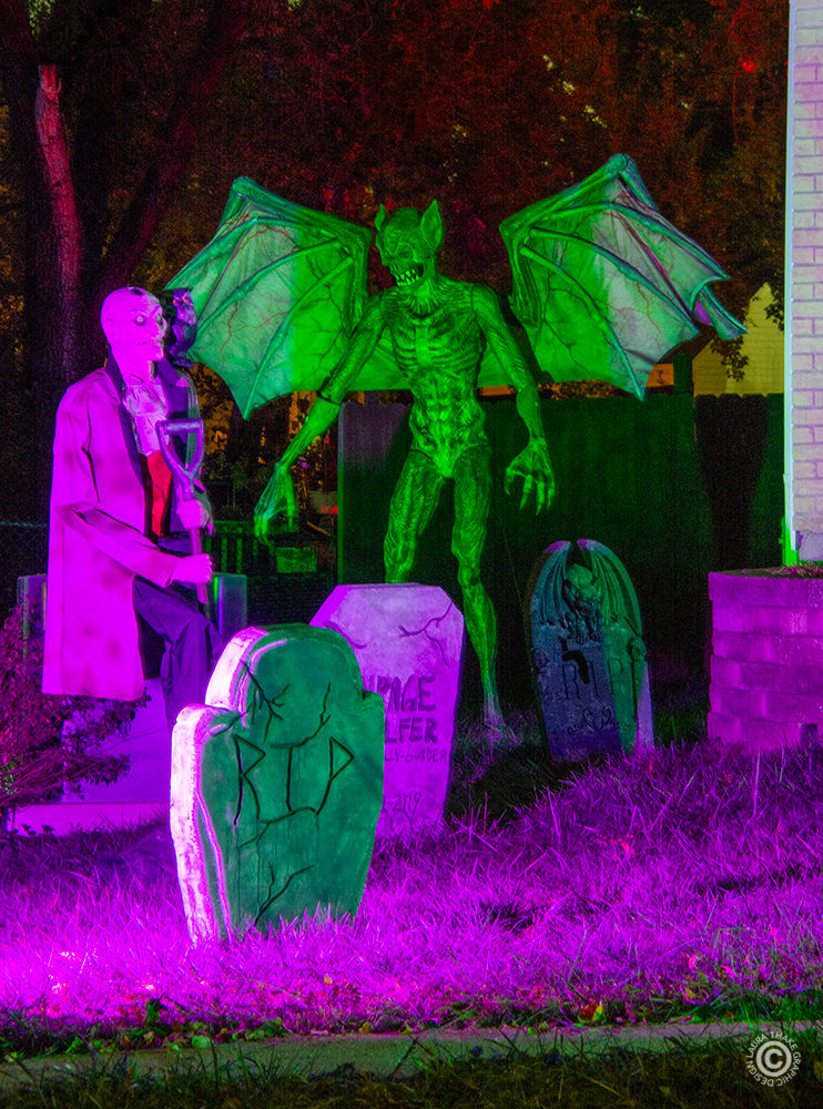 The demon soul sucker is descending on the poor grave digger.