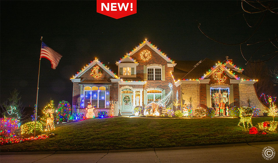 A beautiful nativity scene sits at the center of this Christmas display.