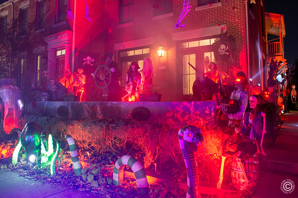 The Pirates of the Caribbean hoisting the sails and each other into the trees.