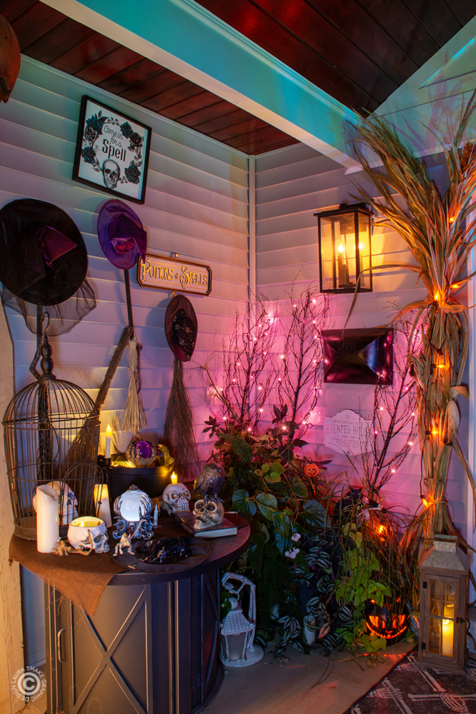 The witches have an area to park their brooms and hats before they go inside.