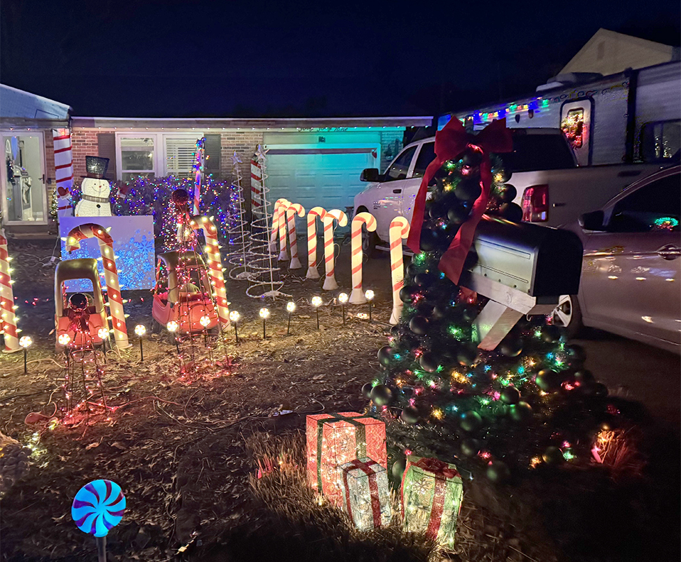 The Little Tikes Cozy-Coupe area has moved to the center of the yard.