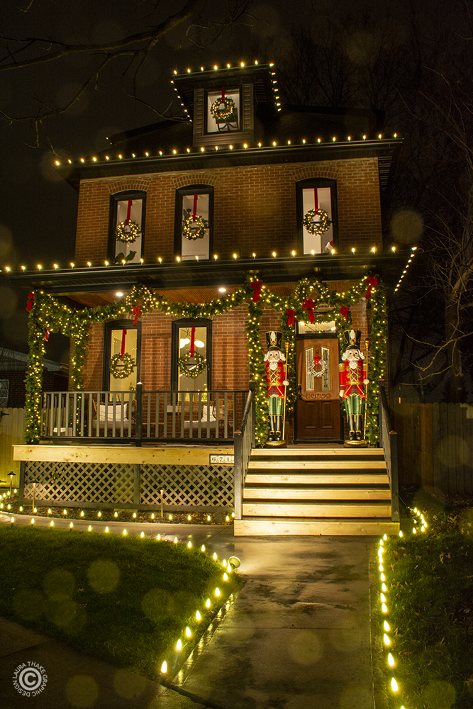 White Christmas lights decorate this house in St. Louis MO.