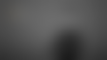 A man in a suit stands with his arms crossed against a plain grey background. The logo of Global Asset Solutions appears in the top left corner.