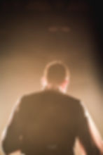 This was taken behind the first curtain whilst the actor was in performance. The light on him created this incredible back light. I was unable to see the image when taking it as I literally poked the camera through the second curtain. I was pleased with the result.