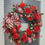 Thumbnail: Large Festive Door Wreath in Red with Mistletoe 