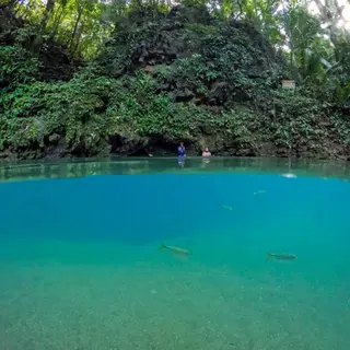 Blue Hole National Park in Belize, home to St. Herman's Cave and the Inland Blue Hole cenote.