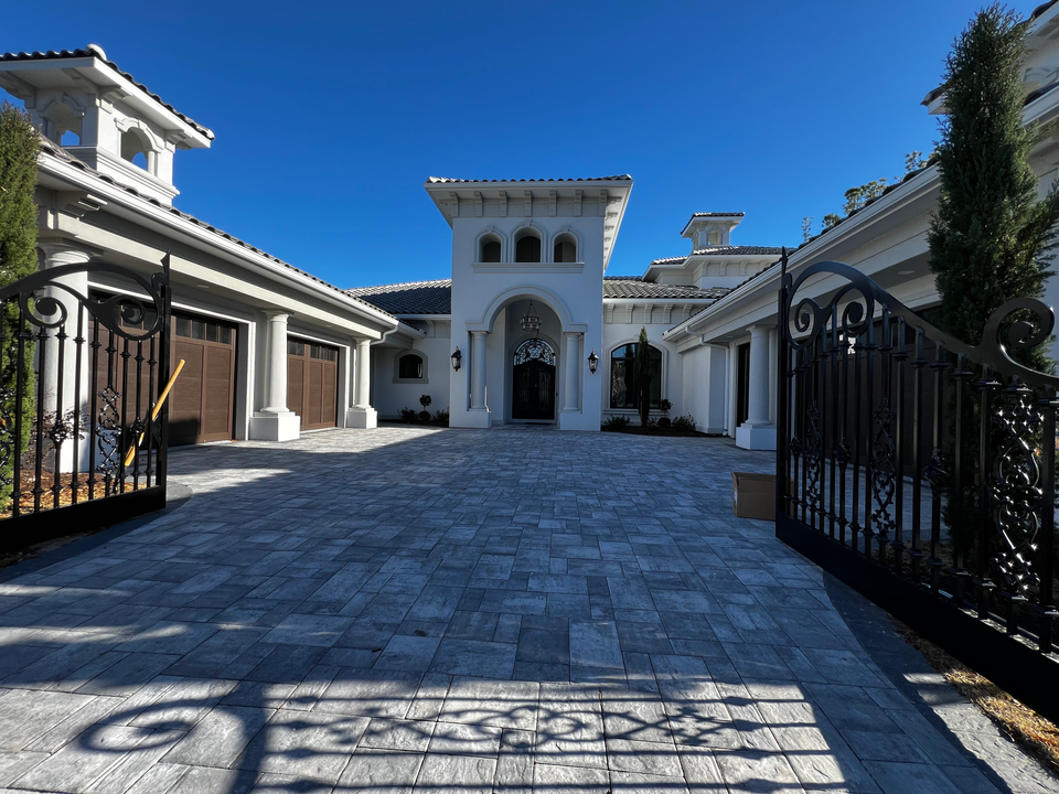 Custom home technology integration with lighting control, audio video, networking, and security systems.