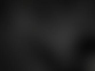 young boy reaching up to starry sky