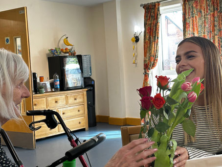 Enjoying a chit-chat during a flower-making workshop