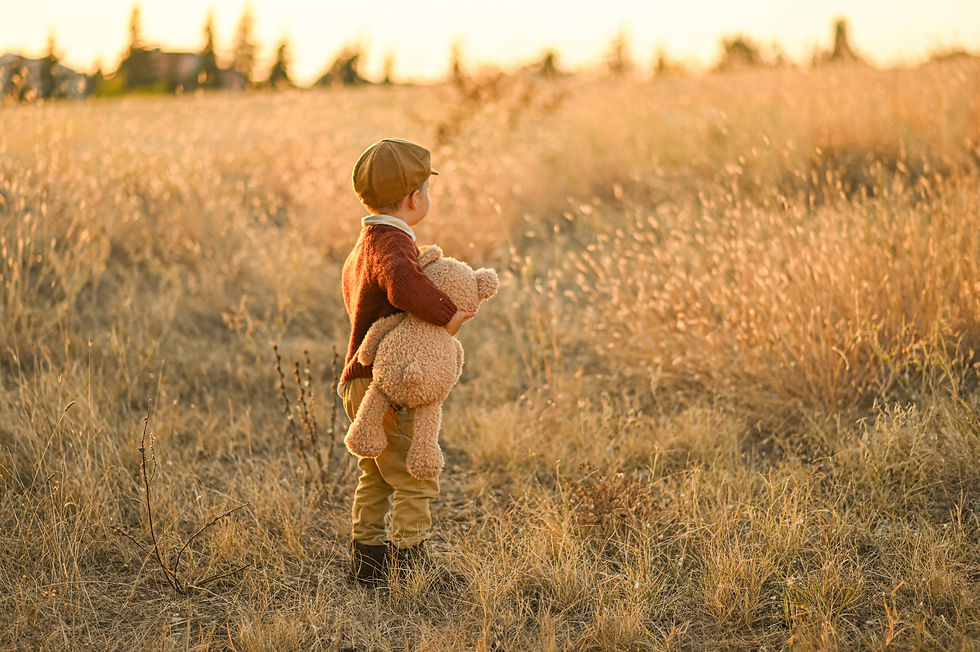 vecteezy_in-the-warm-glow-of-sunset-a-boy-wearing-vintage-suspenders_60657637.jpg