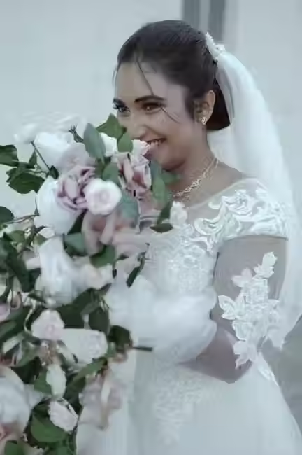 Candid shot of bride at wedding ceremony